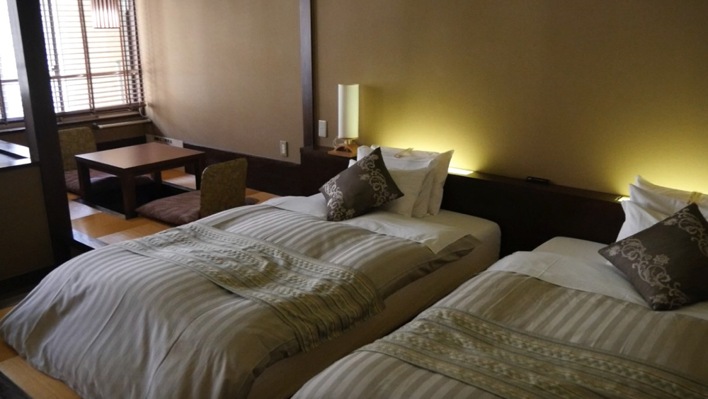 蔵王温泉の深山荘高見屋の寝室の写真